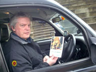 Edinburgh taxi driver with copy of The Lost World on launch day.