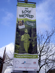 A Lost World Read 2009 banner in Bristol city centre depicting Darwin.