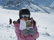 Rebecca reading The Lost World on the slopes at Val d'Isere.